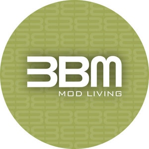 May include: A green circle with a repeating pattern of the letter "S" in white. The text "3BM MOD LIVING" is in white letters on the circle.