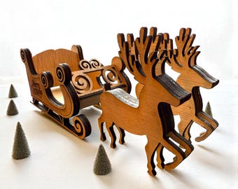 Trineo de Papá Noel y renos de madera - Decoración navideña cortada a láser