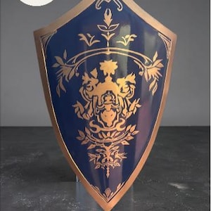 Escudo medieval con cresta de león - Escudo de caballero decorativo rojo y dorado para exhibición o cosplay.