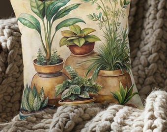 Cojín con ilustración de plantas de interior en maceta, cojín botánico decorativo, cojín decorativo en tonos tierra, decoración con suculentas y terracota.
