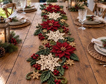 May include: A long, decorative table runner featuring a crochet design of deep red poinsettia flowers, cream-coloured snowflakes, dark green leaves, and small red berries arranged in a continuous pattern along the centre of a wooden table.