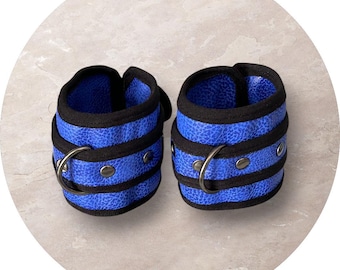 Wurst Band Cuffs. Blue color. Faux Leather.