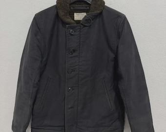 Kurtka pokładowa USN zaprojektowana przez japońską markę Cootie Production Garment Worker, wyprodukowana w Japonii