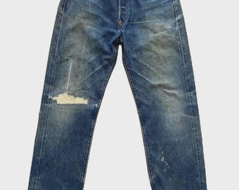 Levi's Big E Selvedge vintage de los años 90, reproducción con remache oculto y hebilla trasera. Fabricado en EE. UU.