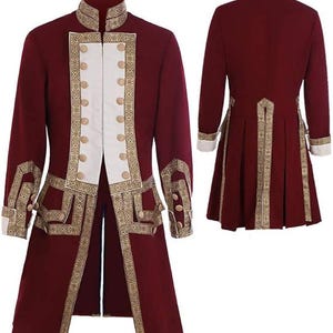 May include: A burgundy long coat with gold trim and white accents. The coat features a high collar, decorative buttons, and ornate gold detailing along the edges and cuffs. The back view shows a pleated skirt and matching gold trim. A historical costume.