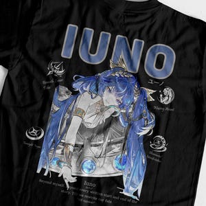May include: A black t-shirt featuring a large graphic print of an anime-style character with long blue hair. The text IUNO is printed in large blue letters at the top. Surrounding the character are four circular icons with text labels and a quote at the bottom.