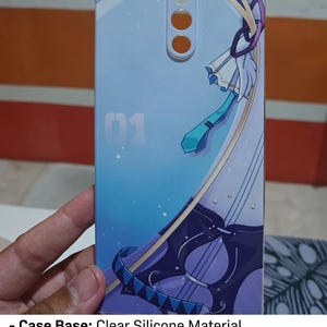 May include: A rectangular phone case with a light blue and purple anime-style graphic print. The design features the number 01, a teal necktie, and a stringed instrument. The case has circular cutouts at the top for camera and sensor components.