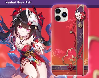Pode incluir: Uma capa de smartphone com fundo vermelho, uma faixa vertical roxa, um motivo floral com contorno dourado e um emblema de máscara de raposa com um sino. O design inclui o texto SPARKLE Honkai Star Rail e uma ilustração de personagem.