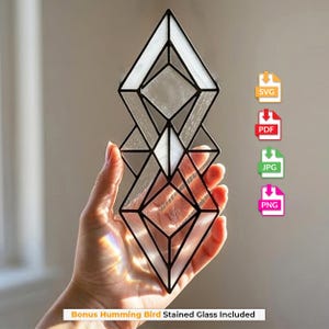 May include: A geometric stained glass suncatcher featuring clear, textured glass panels framed in black metal. The design consists of stacked diamond shapes. To the right are icons labeled SVG, PDF, JPG, and PNG. Text at the bottom reads Bonus Humming Bird Stained Glass Included.