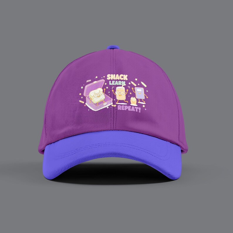 May include: A purple baseball cap with a blue brim. The cap features the text "SNACK LEARN REPEAT!" above a graphic of a sandwich, a bag of chips, and a book. The cap is a casual accessory.