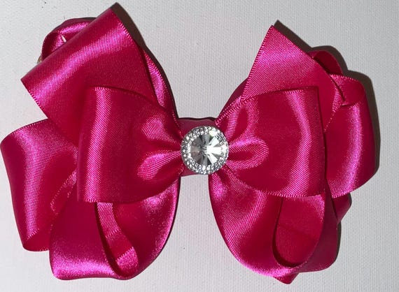 Satin three layer bow with stone center
