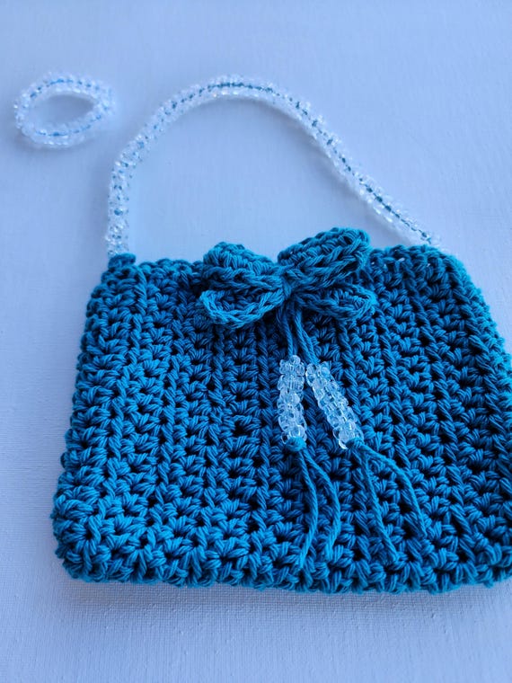 Pretty little bow bag. Handmade crochet purse for little girls with matching bracelet