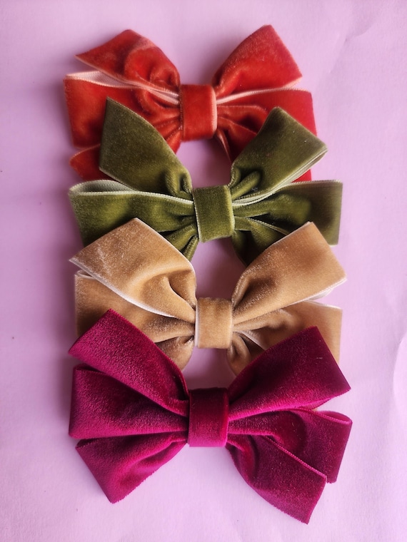 Set of four velvet pinwheel bows. Fall colors