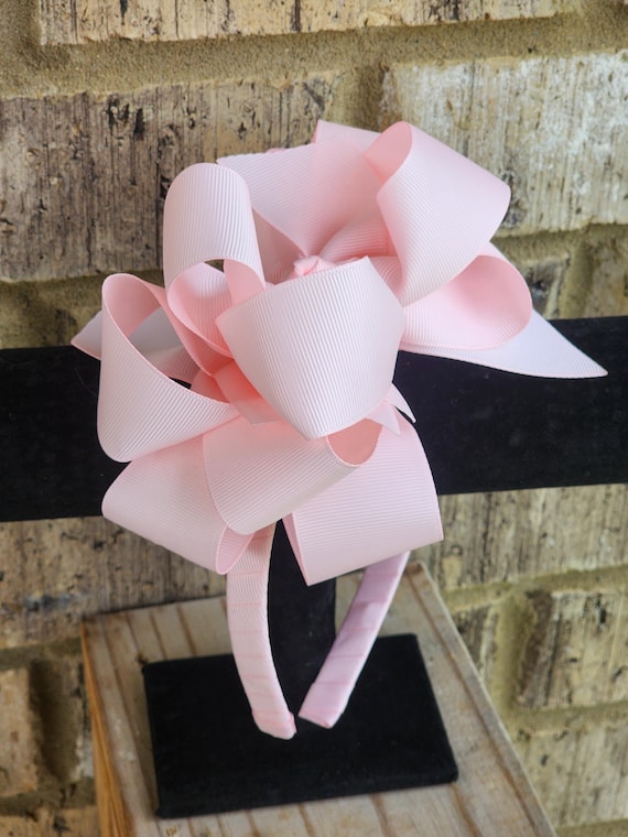 Boutique headband with large triple layer bow