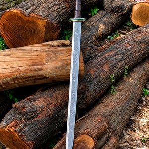May include: A double-edged sword with a patterned Damascus steel blade, a dark brown wooden grip, and a metallic pommel and guard featuring green accents. The blade displays a distinct wavy, layered metal texture along its entire length.