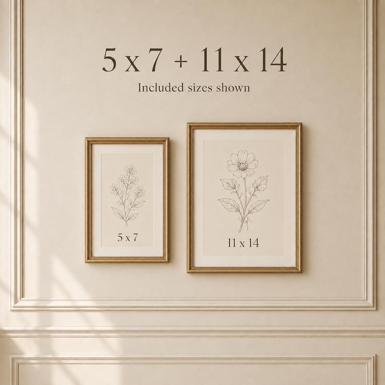 May include: Two framed wall art prints with gold-toned frames. The smaller print features a botanical line drawing of a flower with the text 5 x 7. The larger print displays a floral line drawing with the text 11 x 14. Text above reads 5 x 7 + 11 x 14.