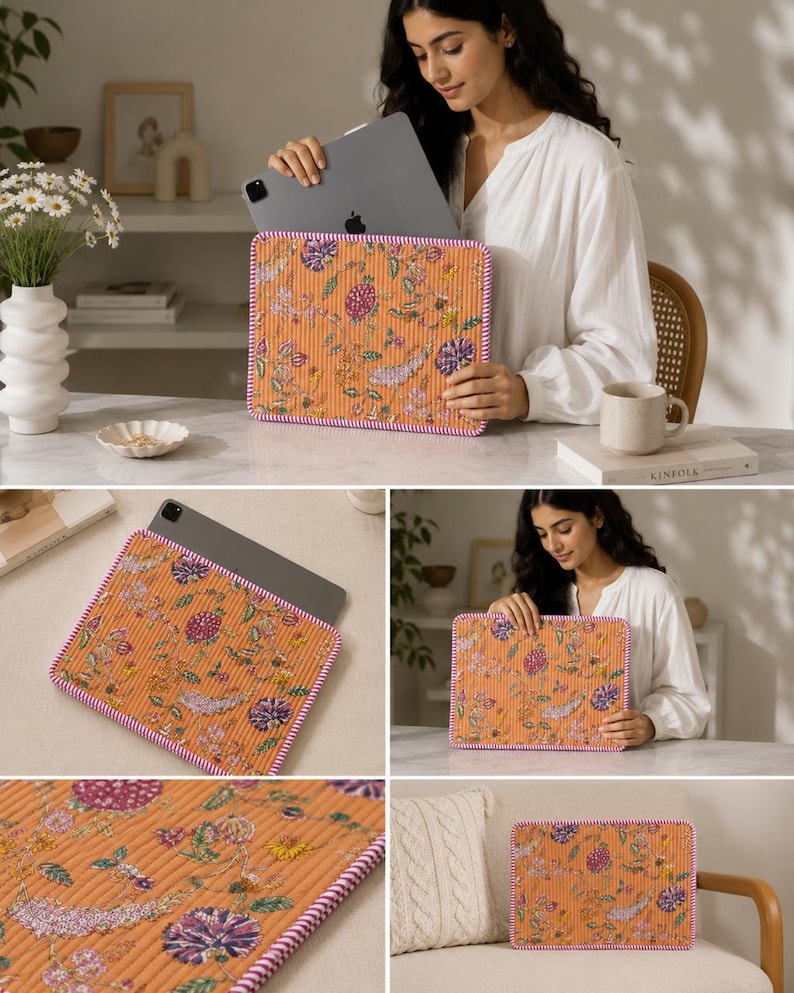 May include: Orange floral patterned tablet sleeve with a pink and white border. The sleeve is made of a textured fabric and features a colorful floral design with purple, yellow, and green accents. The tablet sleeve is shown with a tablet inside.