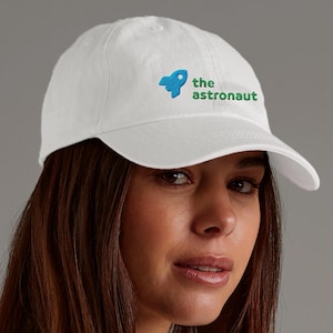 The Astronaut Dad Cap | Minimal Blue Embroidery with Rocket | Black or White | Flexfit 6277