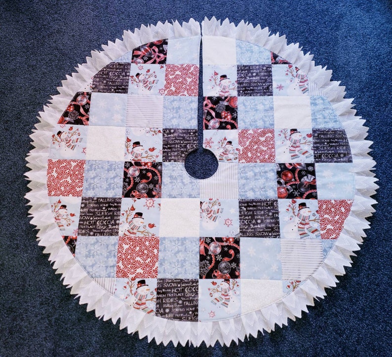 Snowman Patchwork quilted tree skirt 39 wide.