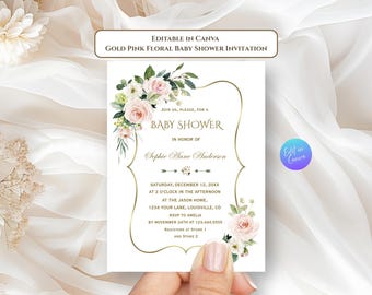 May include: A baby shower invitation with a gold frame and floral accents. The invitation features the text "Baby Shower" and details for the event, including the date, time, and location. The text "Editable in Canva" is at the top.