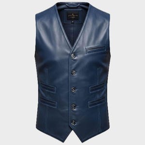 May include: A navy blue leather vest with a V-neck and a button-down front. The vest has two front pockets and decorative stitching. The vest has a tailored fit and a classic design.