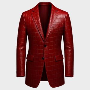 May include: A red blazer with a crocodile skin texture. The blazer has a notched lapel, two front pockets, and two black buttons. The jacket is a solid color and has a tailored fit.