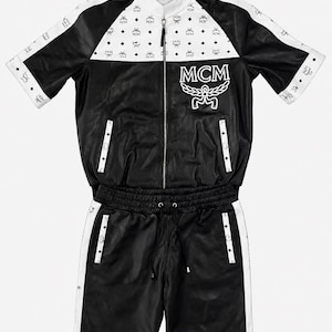 Luxury handmade leather co ord set for men with matching leather shorts and designer-inspired streetwear styling.