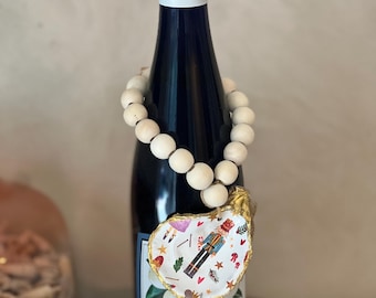 Handcrafted Oyster Shell Wine Charm: Coastal Wedding Favor, Christmas Nutcracker Decor