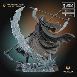 May include: A detailed figurine of a cloaked figure wielding two scythes, with a flowing cape and a base of icy formations. The figure is in a dynamic pose, with the text "PRESUPPORTED AND MAGNET-READY" visible. The scale is 1:10.