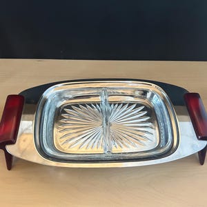 MCM serving dish chrome with red Bakelite handles