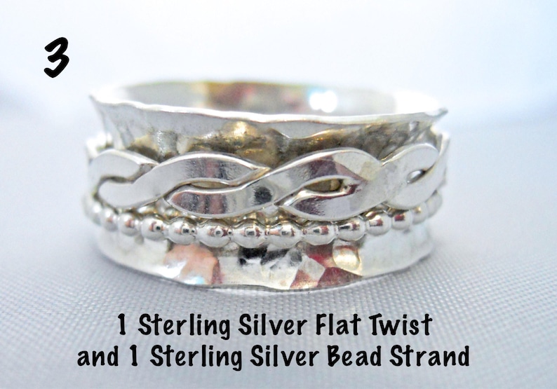 May include: A silver ring with a twisted band and a row of beads. The ring is made of sterling silver and has a hammered finish. 1 Sterling Silver Flat Twist and 1 Sterling Silver Bead Strand.