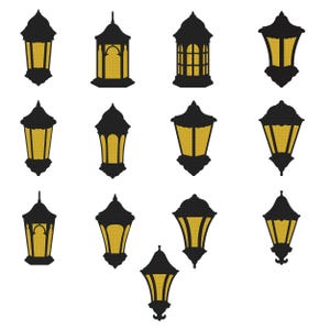 May include: A collection of black and gold lanterns in various shapes and sizes. Each lantern has a black frame with a gold interior, creating a warm, inviting glow. The lanterns are arranged against a white background.