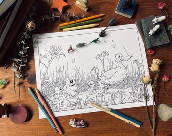 May include: A black and white coloring book page featuring a duck and ducklings in a grassy area, with a monster-like creature. Colored pencils and small animal figurines surround the page on a wooden surface.