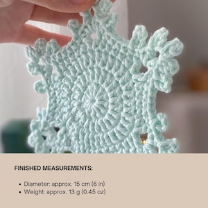 Crochet snowflake coaster made with cotton yarn, perfect as a Christmas table decoration, tea or coffee cup mat, or handmade gift. Digital crochet pattern PDF for beginners and intermediate crocheters.