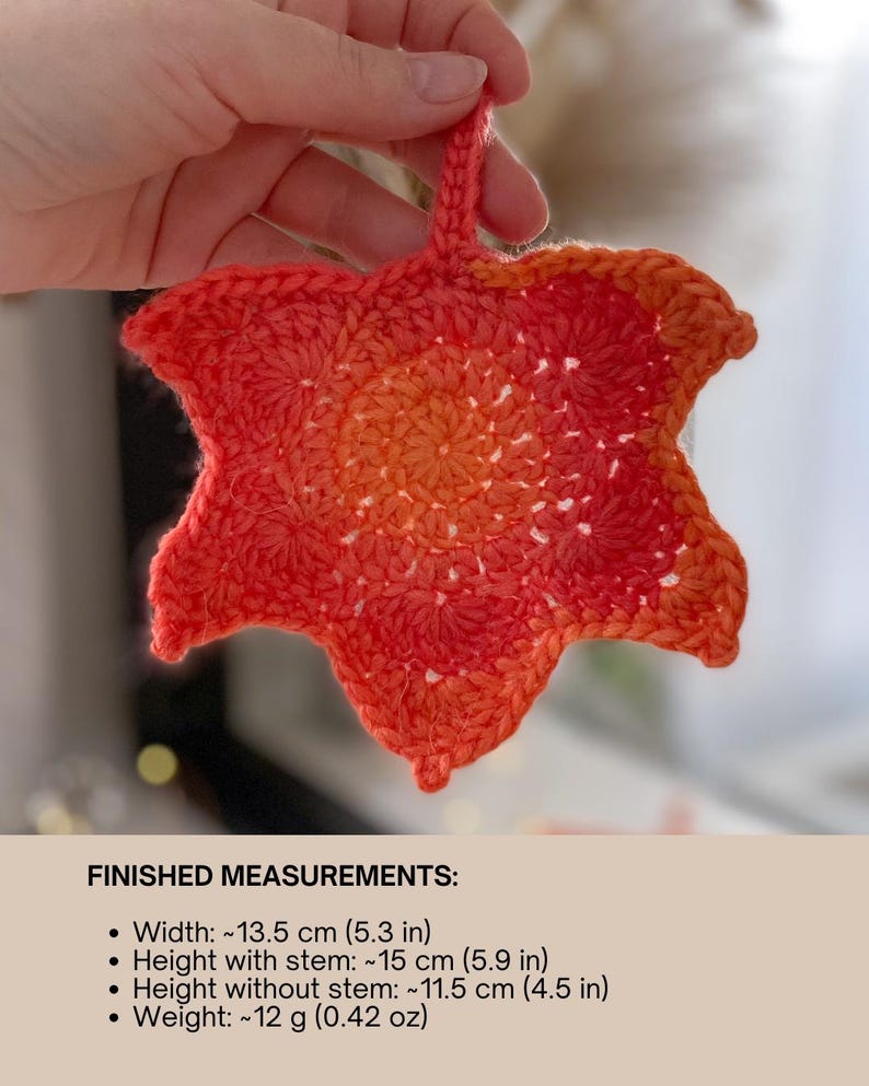 Large crochet maple leaf coaster made with ombré autumn yarn. Handmade fall home décor perfect for table settings, seasonal decorations, or as a unique crochet gift