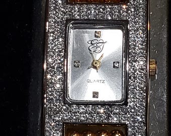 Vintage Elizabeth Taylor White Diamonds gold and silver quartz watch. New in box.