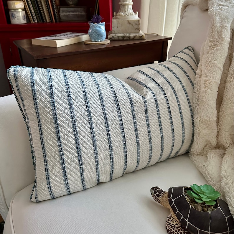 Coastal Blue and Navy Chenille stripes on an ivory background make this stunning pillow cover perfect for coastal or modern farmhouse decorating.