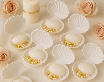 Trouwbedankje oesterschelpkaars: gouden parels, gepersonaliseerd label