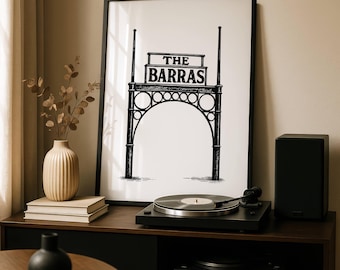 May include: Framed black and white print with the text "THE BARRAS" above an arched design. The print is on a dark wood cabinet with a record player, speaker, and a decorative vase.