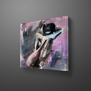 May include: Abstract canvas art depicting figures in black, pink, and grey tones. The painting uses a textured, brushstroke technique, emphasizing form and emotion. The background is a blend of purple and grey.
