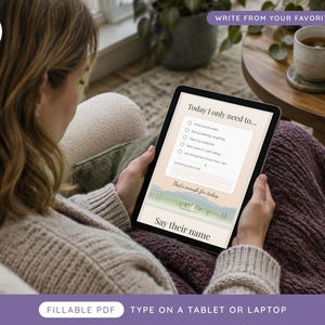 May include: A digital tablet displaying a fillable PDF checklist titled Today I only need to... with checkboxes for daily tasks, followed by the text That's enough for today and Say their name, featuring a soft landscape illustration at the bottom.