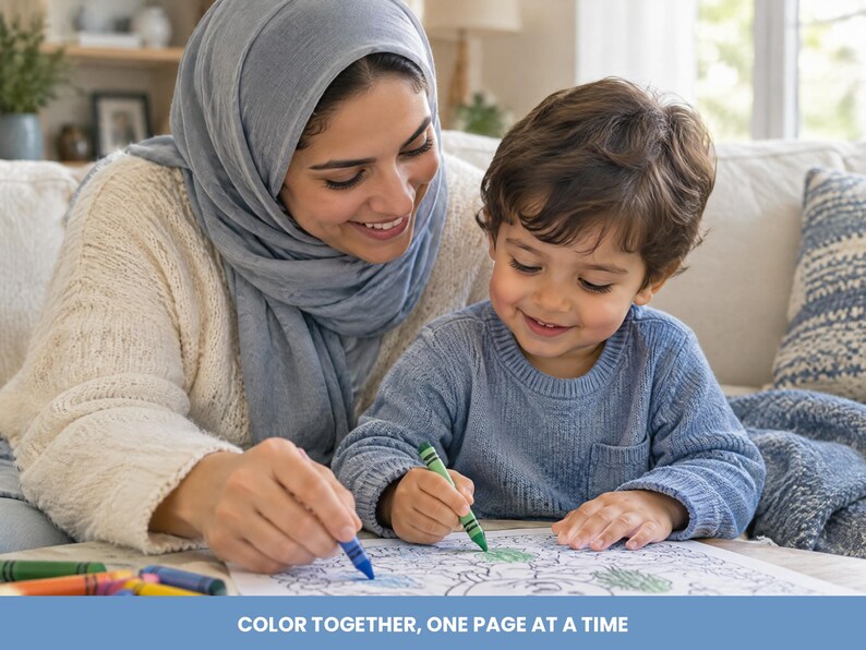 May include: A person wearing a light blue hijab and cream sweater and a child in a blue long-sleeve shirt coloring on a white paper with crayons. The text at the bottom reads: COLOR TOGETHER, ONE PAGE AT A TIME.
