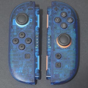 EXTREMERATE CLEAR Blå Joy-Con 2 för Nintendo Switch 2 - Med Remmar - NY!