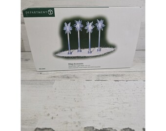 Department 56 Village Accessories Postes de luz con forma de copo de nieve, juego de 4, color azul, descatalogado