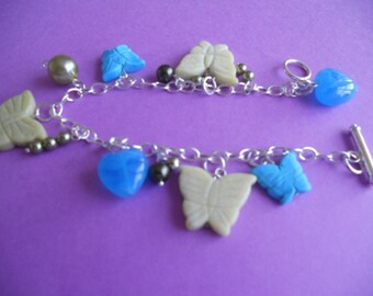 Armband vlinders met prachtige parels - blauw en groen