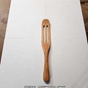 May include: A wooden slotted spatula with a rounded handle and three slots. The spatula is made of light-colored wood and is displayed on a white surface. The text "DIGITAL DOWNLOAD ONLY" is at the bottom.
