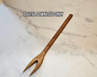May include: A long, two-pronged wooden fork with a visible grain pattern. The text "DIGITAL DOWNLOAD ONLY" is printed in black above the fork. The utensil features a slender handle and two pointed tines, showcasing a natural brown wood finish.