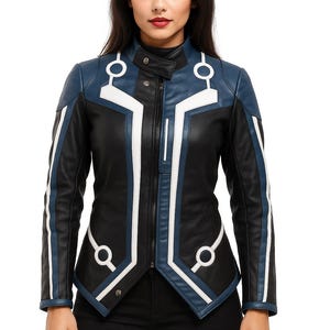May include: Black and blue leather jacket with white detailing. The jacket has a stand-up collar, a zip fastening, and white geometric patterns. The sleeves have white stripes. The jacket is worn over black trousers.