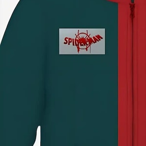 May include: A teal and red jumpsuit featuring a red zipper and a rectangular patch with the words "Spider-Man" and a spider web graphic in red. The jumpsuit is a solid teal color with a red stripe down the front.