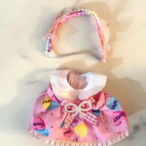 Labubu dress with head accessorie.